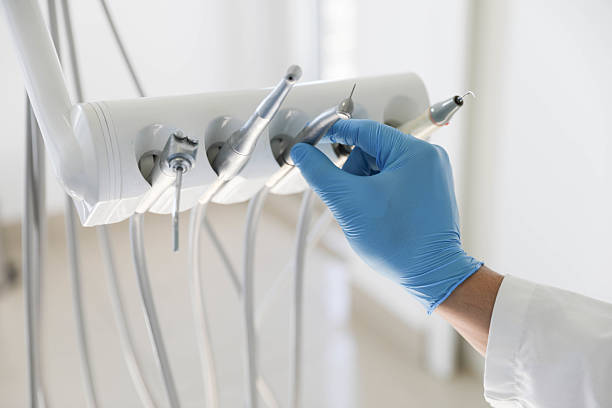Professional Tooth Extraction technician working in McPherson, KS